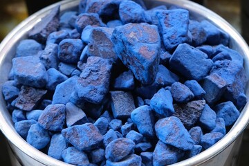 Basket with indigo colorant on bazaar in Deira, Dubai, UEA