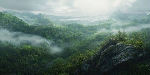 Obraz premium Lush green hills under cloudy sky panorama