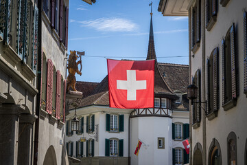 flag of switzerland i the historic city of thun bernese oberland