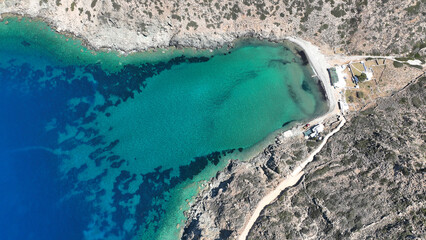 Aerial drone photo from tropical exotic paradise secluded rocky island bay with deep turquoise sea...