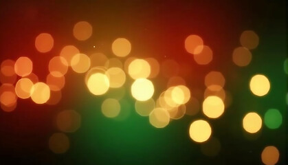 Fototapeta premium The abstract composition features vibrant bokeh lights in gold, red, and green, blurred against a dark background, creating a dreamy, layered effect with shimmering highlights.
