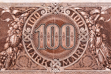 Vintage elements of old paper banknotes.Bonistics.Old Germany money 1918 (one hundred mark).Banknote Kaiser's Germany.Fragment banknote for design purpose.