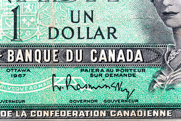 Vintage elements of old paper banknotes.Bonistics.Canada 1 Dollar 1967 Banknotes.Fragment banknote...