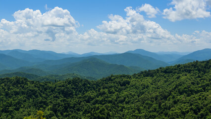 Green mountain with sky clouds natural landscape at sunny weather.