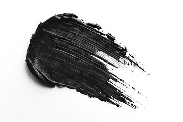 Black mascara brush stroke on white background  cosmetic product swatch.