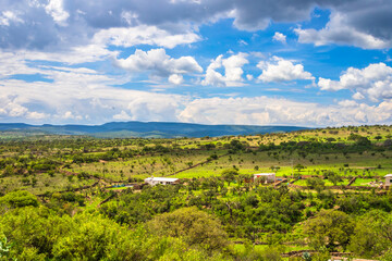 Rural landscape of the low deciduous forest, mountains with vegetation and blue sky with clouds, at the Los Cardos ranch in Monte Escobedo, Zacatecas