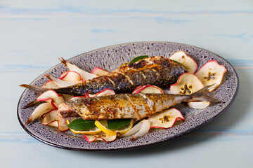 Grilled mackerel fish with roasted potatoes and broccoli
