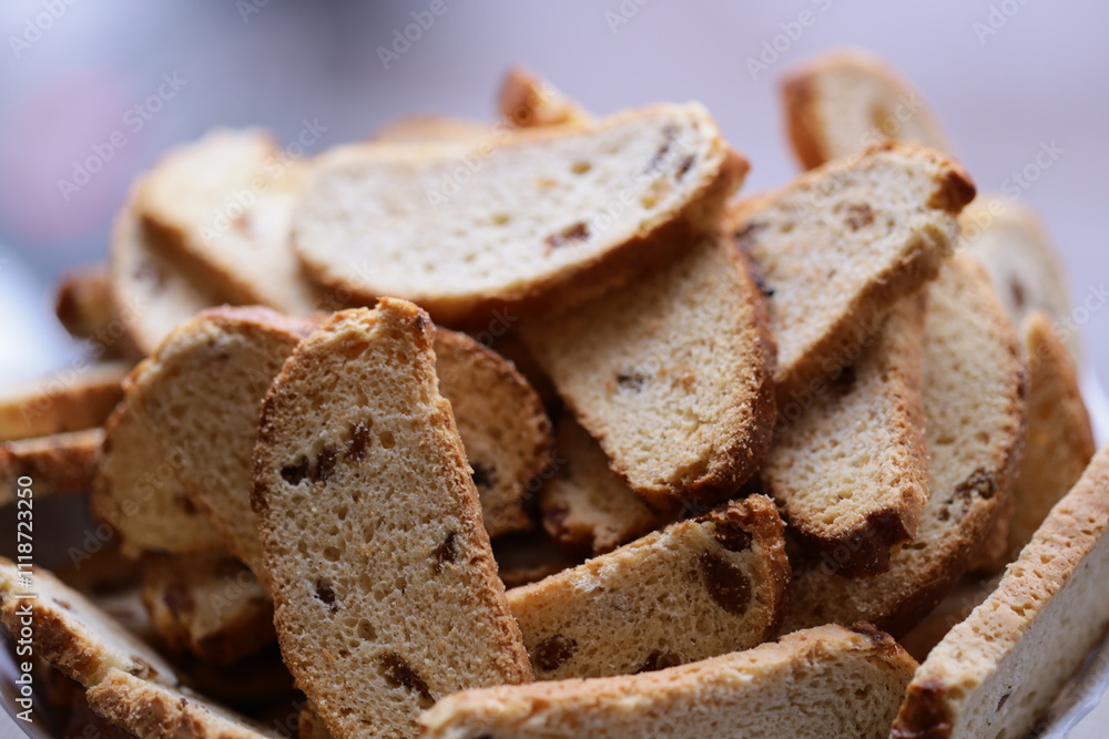 Aufkleber a bowl filled with sliced bread on a table, suitable for editorial or lifestyle use.