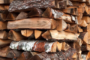 stack of firewood as a winter textured background