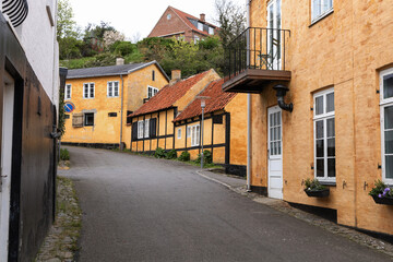 Fototapeta na wymiar Traditional old residential houses with tiled roofs on the island of Bornholm, Denmark