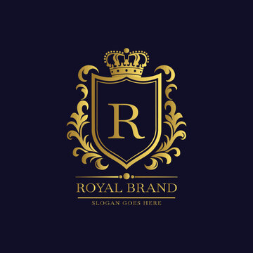 Elegant luxury brand logo with golden crown shield and decorative floral patterns on a dark blue background  
