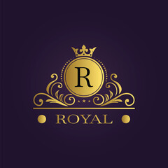 Luxurious gold royal emblem with ornate flourishes and crown on dark purple background