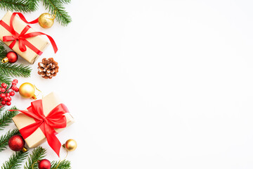 Christmas Present box, fir tree and decorations at white backgrouns.