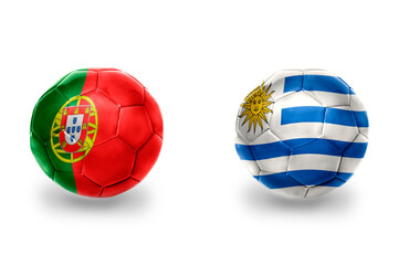 Obraz premium football balls with national flags of portugal and uruguay ,soccer teams. on the white background.