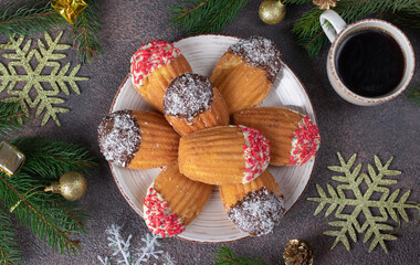French madeleine cookies with chocolate and coconut shavings, Top view