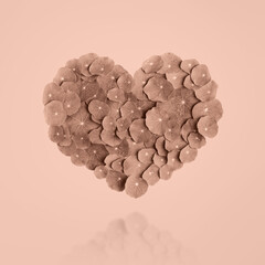 Mockup of the heart is made of leaf. Demonstrating the colors of 2025 - Mocha Mousse.