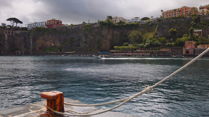 Obraz premium Storm clouds above the harbor in Sorrento, Italy