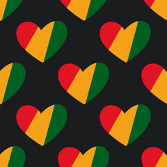 Black History Month seamless pattern. A print with hearts in traditional African colors - red, yellow and green. Juneteenth background.