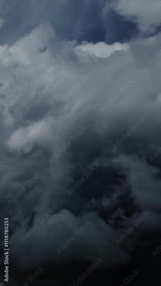 Wall mural lot of lightning during a thunderstorm. storm clouds are moving fast on the viewer, timelapse. verti