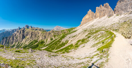Hiking trail winding through the majestic tre cime di lavaredo, dolomites, italy