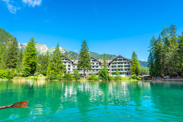 Rowing on lake braies with hotel pragser wildsee in background