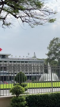 Frontal perspective of Independence Palace or Reunification Palace Dinh Doc Lap is designed main public landmark in the afternoon by architect. Ngo Viet Thu