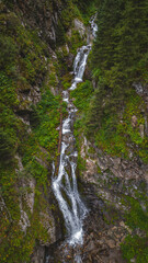 Drone picture of river from above high up in the mountains