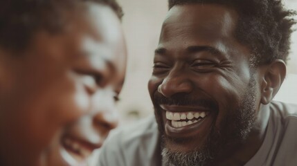 Black man enjoying a moment with his children / African American family