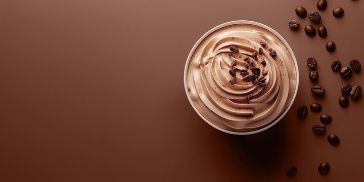 Top view of mocha mousse dessert, soft brown background. Color trend concept, tasty banner with place for text
