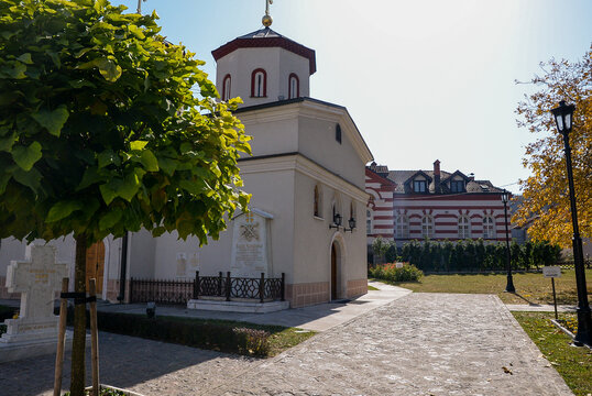October 6, 2018 - Belgrade, Serbia. The church in the gate of the Rakovica Monastery with a part of the courtyard and the tombstones of His Holiness the Patriarch of the Serbian Gentleman Pavle 