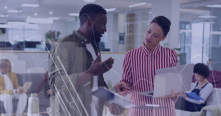 Image of financial data processing over diverse business people in office