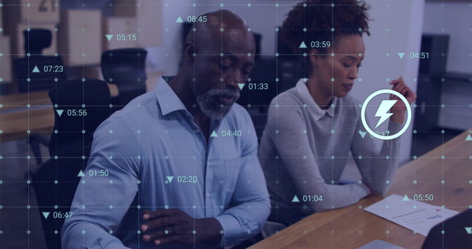 Image of financial data processing over diverse business people in office