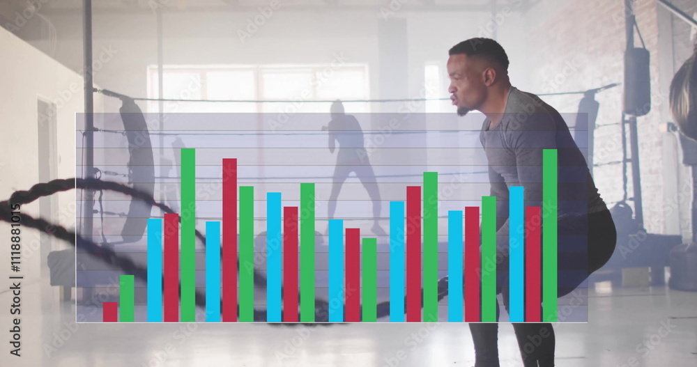 Poster image of data processing and diagrams over biracial man exercising with ropes at gym