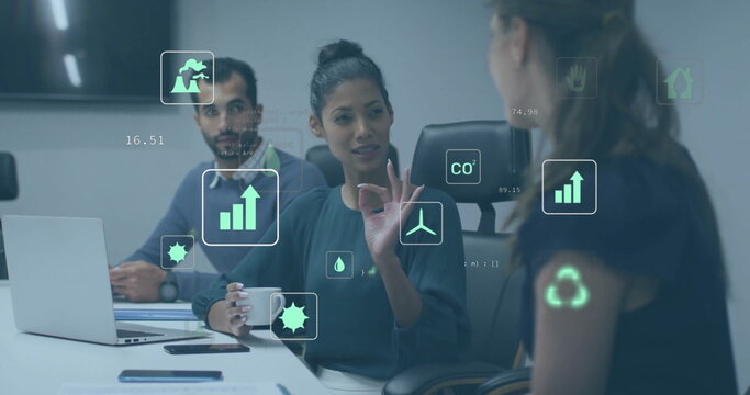 Image of ecology icons and data processing over diverse colleagues discussing work in office