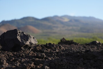 Maui landscape in the morning with lava rocks and the Volcano