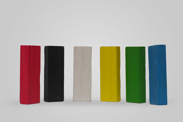 Equality, diversity, inclusion concept. Multi colored wooden block standing together on white