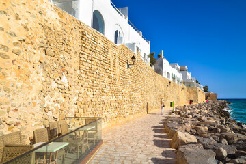 Promenade along the ancient defensive walls of the medina, Hammamet, Tunisia.