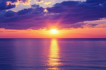 A serene sunset over calm waters, showcasing vibrant colors and tranquility.