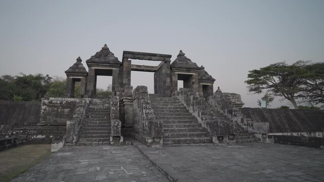 Yogyakarta, Indonesia - Candi Ratu Boko Palace archaeological site in Java. South of Prambanan temple complex during Sunset
