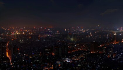 A vibrant city skyline illuminated at night, showcasing urban life.