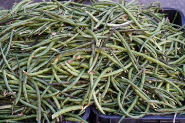 fresh and organic vegetables at the market , beans