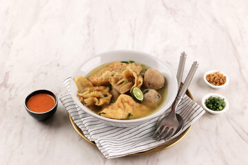 Baso Cuanki Bandung, Meatballs and Batagor Topping Cooked in Stock Soup.