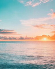 Fototapeta premium A serene sunset over calm ocean waters, creating a tranquil atmosphere.