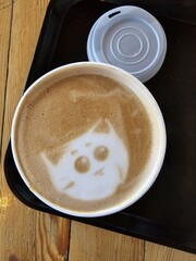 The coffee with picture of a cat face