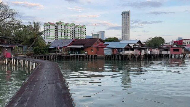 Serene morning scene of wooden floating village in Penang. Clan Jetty in Penang. Rustic living condition. 