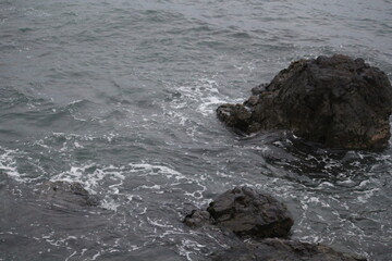 Naklejka premium Image of waves crashing on Imrang Beach in Busan, Korea 