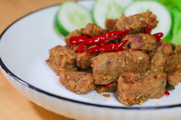 Indonesian Food - Tempeh Sweet Soy Sauce or Orek Tempe. Top View with Copy Space for Advertisement