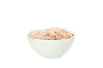 Pink sea salt in bowl on white background, close up