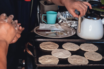 Homemade food known as gorditas in México filled with different types of stews