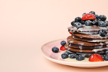 Chocolate pancakes, tasty breakfast, concept of delicious food, space for text